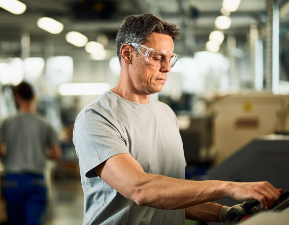 industrial engineer operating cnc machine production line